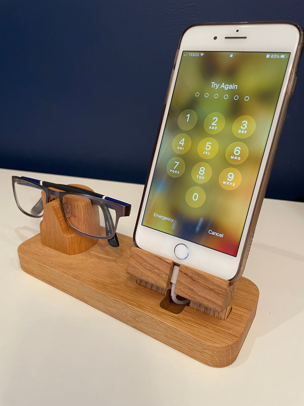 Phone and glasses holder, charging station, desk and bedside organiser